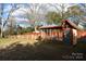 Chicken coop and run in a fenced backyard at 106 N Battleground Ave, Kings Mountain, NC 28086