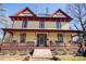 Two-story Victorian home with wrap-around porch and charming details at 106 N Battleground Ave, Kings Mountain, NC 28086