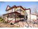 Side view of the house showcasing screened porch and patio area at 106 N Battleground Ave, Kings Mountain, NC 28086