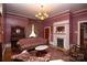 Living room features hardwood floors, fireplace, and antique furniture at 106 N Battleground Ave, Kings Mountain, NC 28086