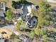 Drone shot of an estate featuring a pool and well manicured lawns at 115 Amelia Ln, Mooresville, NC 28117