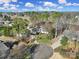 Drone shot of an estate featuring a well manicured lawn and circular driveway at 115 Amelia Ln, Mooresville, NC 28117