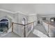 Upstairs hallway with white railing and a window allowing lots of natural light into the house at 115 Amelia Ln # 29, Mooresville, NC 28117