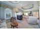 Comfortable main bedroom with a fireplace, sitting area, and classic decor at 115 Amelia Ln # 29, Mooresville, NC 28117