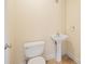 Simple and clean powder room with pedestal sink and toilet at 119 Heritage Creek Dr, Hickory, NC 28601
