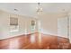 Spacious primary bedroom with hardwood floors and access to en-suite bath at 119 Heritage Creek Dr, Hickory, NC 28601
