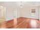 Primary bedroom with hardwood floors, chandelier, and multiple closets at 119 Heritage Creek Dr, Hickory, NC 28601