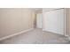 Bedroom with carpet, double doors, and chandelier at 119 Heritage Creek Dr, Hickory, NC 28601