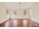 Bright bedroom featuring hardwood floors and chandelier at 119 Heritage Creek Dr, Hickory, NC 28601