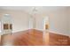Bright primary bedroom with hardwood floors and walk-in closet at 119 Heritage Creek Dr, Hickory, NC 28601