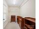 Walk-in closet with custom shelving and hanging rods at 119 Heritage Creek Dr, Hickory, NC 28601