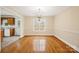 Bright dining room with hardwood floors and chandelier at 119 Heritage Creek Dr, Hickory, NC 28601