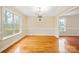 Spacious dining room featuring hardwood floors and large windows at 119 Heritage Creek Dr, Hickory, NC 28601