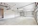 Unfinished garage, featuring concrete floor and overhead door at 119 Heritage Creek Dr, Hickory, NC 28601