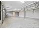 Spacious two-car garage with concrete floor and ample storage space at 119 Heritage Creek Dr, Hickory, NC 28601