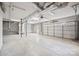Spacious garage with concrete floor and overhead door at 119 Heritage Creek Dr, Hickory, NC 28601