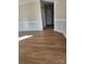 Light and bright hallway with wood-look floors and access to other rooms at 119 Heritage Creek Dr, Hickory, NC 28601