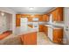 Kitchen with oak cabinets, island, and appliances at 119 Heritage Creek Dr, Hickory, NC 28601