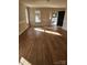 Spacious living room with hardwood floors and sunlight at 119 Heritage Creek Dr, Hickory, NC 28601