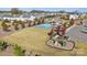 This aerial view showcases the neighborhood pool, clubhouse, and playground at 13312 Chopin Ridge Rd, Huntersville, NC 28078