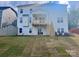 Expansive backyard with newly laid sod and a wooden deck, perfect for outdoor living at 13312 Chopin Ridge Rd, Huntersville, NC 28078