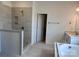 Bathroom features a soaking tub, a walk-in shower, and double sinks with modern finishes at 13312 Chopin Ridge Rd, Huntersville, NC 28078
