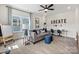 Cozy living room with comfortable seating, bright window, and decor for a study or creative space at 13312 Chopin Ridge Rd, Huntersville, NC 28078