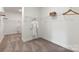 Walk-in closet with metal shelving and carpeted floor; ideal for organizing clothes and accessories at 13312 Chopin Ridge Rd, Huntersville, NC 28078