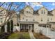 Private backyard with screened porch and landscaping at 13823 Waverton Ln, Huntersville, NC 28078