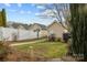 Landscaped backyard with storage shed at 13823 Waverton Ln, Huntersville, NC 28078