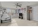 Spacious bedroom with a TV and plenty of natural light at 13823 Waverton Ln, Huntersville, NC 28078