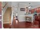 Bright entryway with hardwood floors and staircase leading upstairs at 13823 Waverton Ln, Huntersville, NC 28078