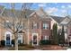 Attractive townhome exterior with landscaping at 13823 Waverton Ln, Huntersville, NC 28078