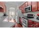 Kitchen features stainless steel appliances and ample counter space at 13823 Waverton Ln, Huntersville, NC 28078