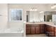 Spacious bathroom with soaking tub and double sinks at 145 Chertsey Dr, Mooresville, NC 28115