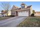 Two-story brick home with a two-car garage at 145 Chertsey Dr, Mooresville, NC 28115