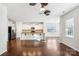 Kitchen with island, stainless steel appliances, and hardwood floors at 145 Chertsey Dr, Mooresville, NC 28115