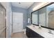 Bathroom with double vanity, modern finishes, and view into the shower at 18742 Nautical Dr # 305, Cornelius, NC 28031