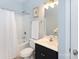 Well-lit bathroom featuring a shower-tub combo and a sleek vanity at 18742 Nautical Dr # 305, Cornelius, NC 28031