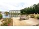 Relaxing pond view from a sitting area, complete with a bench and landscaped surroundings at 18742 Nautical Dr # 305, Cornelius, NC 28031