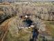 Aerial view of home and surrounding land with driveway at 222 Ingram Rd, Statesville, NC 28625