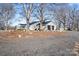 Rear view of the house showing a detached garage and driveway at 222 Ingram Rd, Statesville, NC 28625