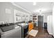 Functional laundry room with washer, dryer, and cabinets at 222 Ingram Rd, Statesville, NC 28625