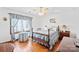 Bedroom with blue and white bedding and a wooden dresser at 2452 Nc 182 Hwy, Lincolnton, NC 28092