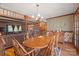 Bright dining room with wood table and chairs, and built-in hutch at 2452 Nc 182 Hwy, Lincolnton, NC 28092