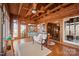 Sunroom with wood cathedral ceiling and access to the dining room and backyard at 2452 Nc 182 Hwy, Lincolnton, NC 28092