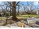 Deck overlooking a spacious backyard with large trees at 2717 Madison Oaks Ct, Charlotte, NC 28226