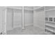 Large walk-in closet with ample hanging space and shelving at 2717 Madison Oaks Ct, Charlotte, NC 28226