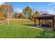 Expansive backyard with lush lawn and gazebo at 4115 Stuart Ln, Indian Land, SC 29707