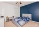 Spacious bedroom with navy feature wall and ceiling fan at 4115 Stuart Ln, Indian Land, SC 29707